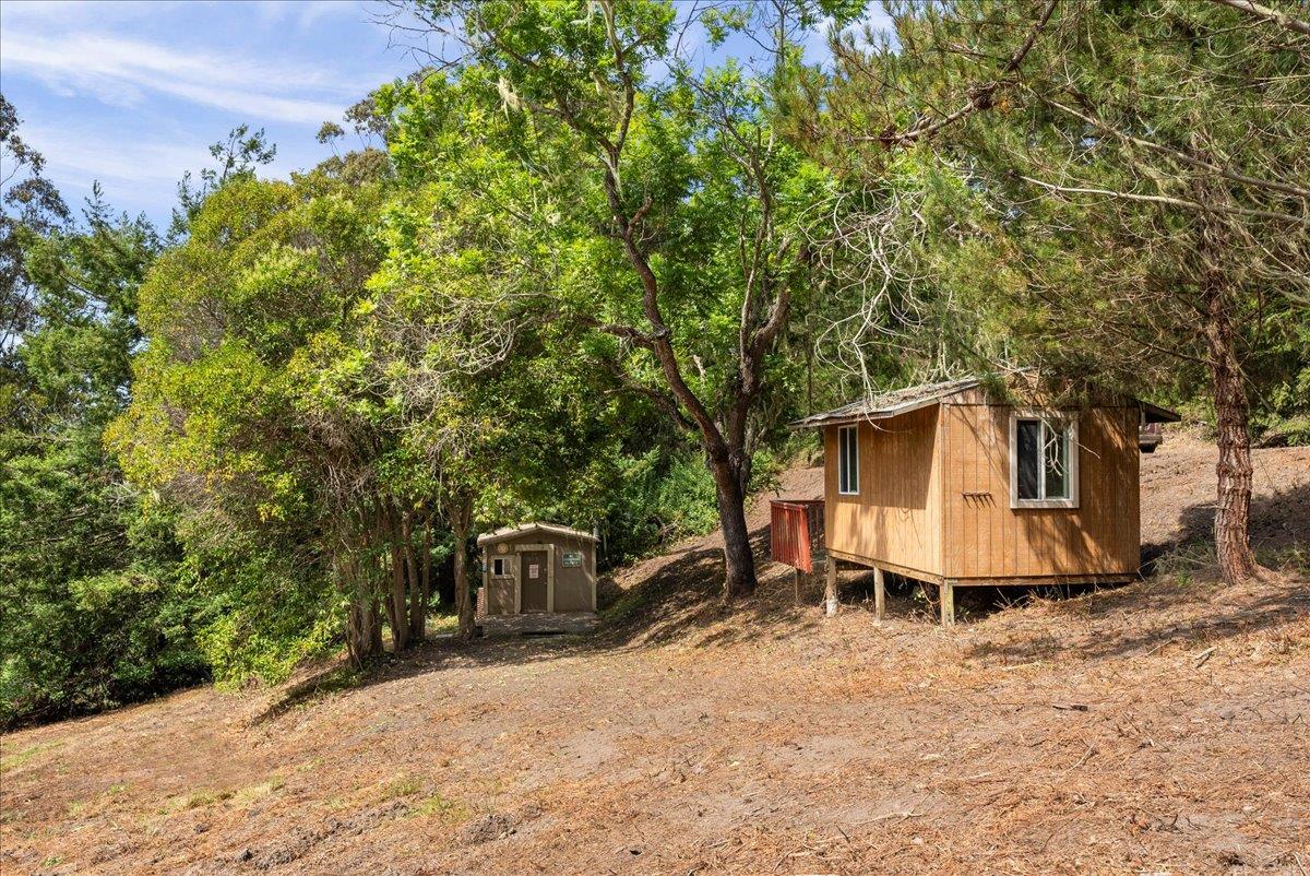 0 Stage Road San Gregorio, CA 94074 - Photo 20 of 48 a view of a chair and table in the backyard