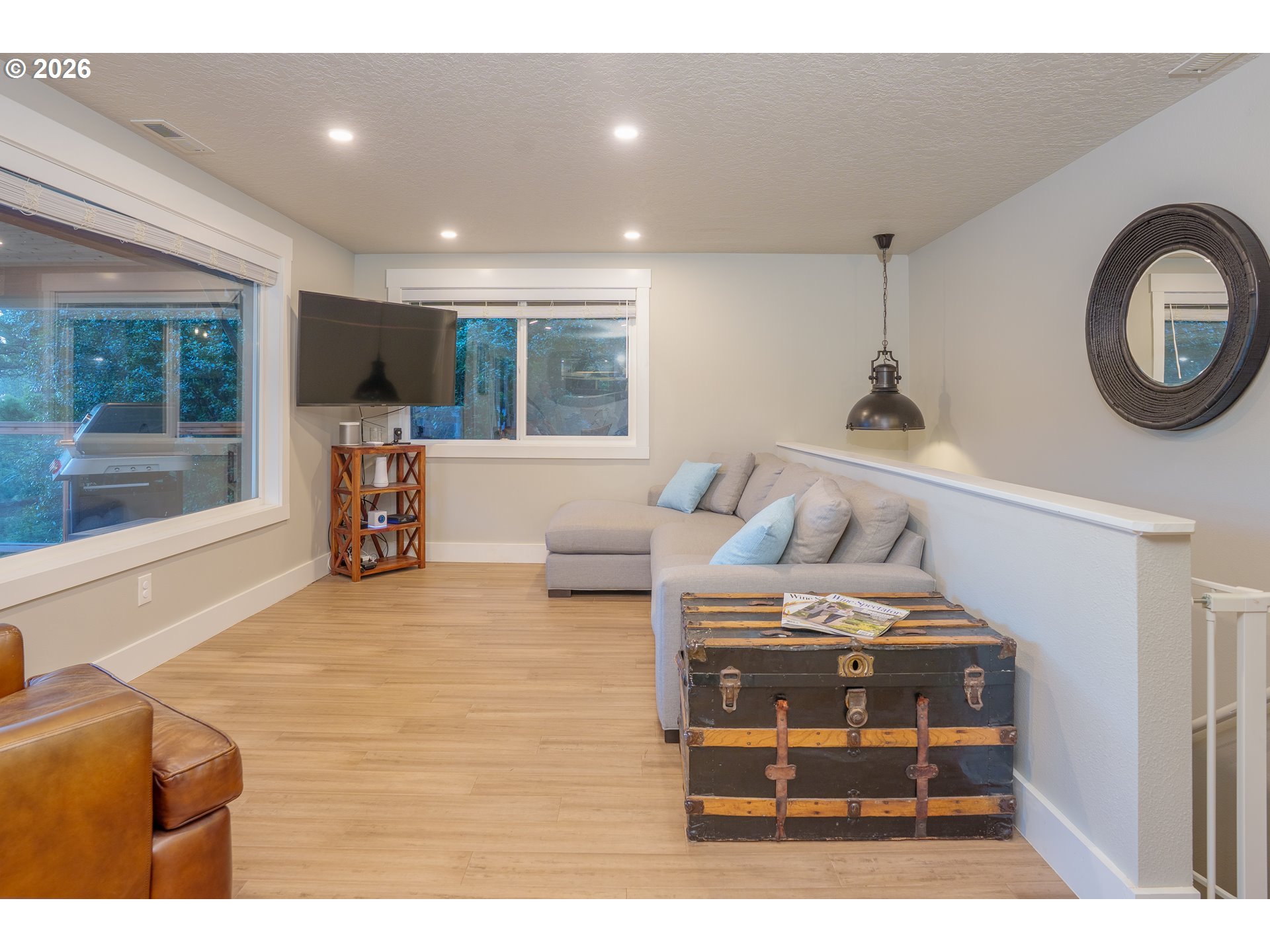 8120 Nehalem Road Nehalem, OR 97131 - Photo 5 of 23 a living room with furniture and a large window