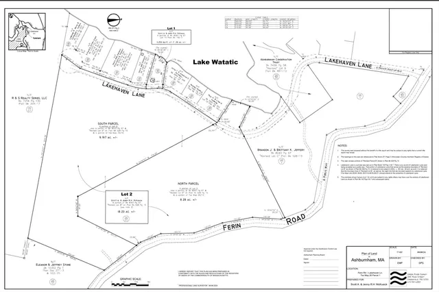 a view of a lake with a yard