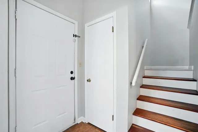 a view of entryway with wooden floor
