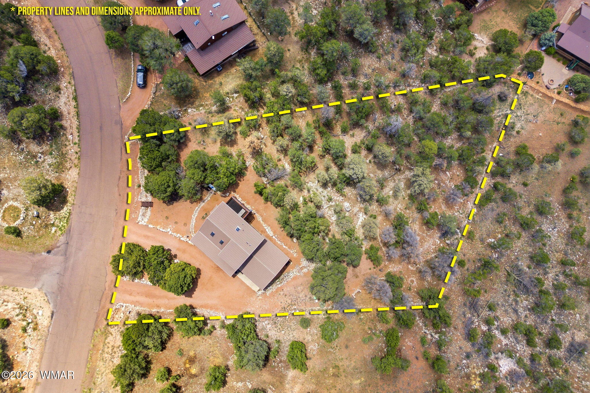 2806 Sky Hawk Drive Overgaard, AZ 85933 - Photo 42 of 43 an aerial view of a house with a yard