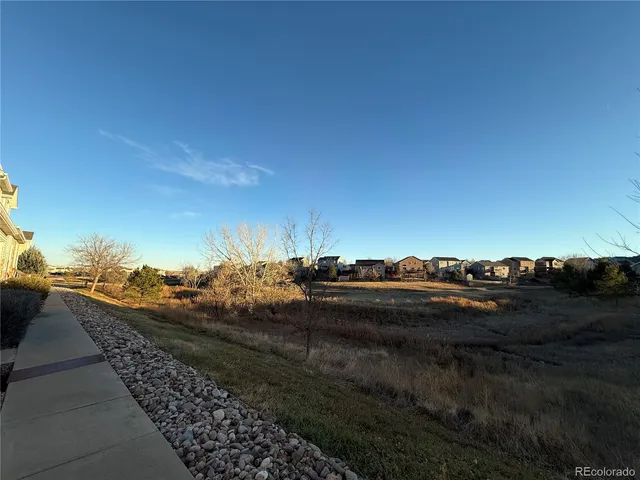 a view of a city street with a building