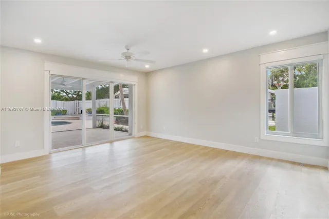 a view of dining room with furniture and window