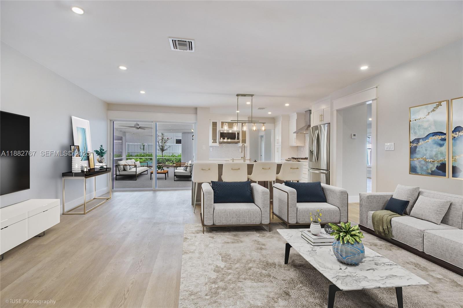 11011 Southwest 110th Road Miami, FL 33176 - Photo 18 of 19 a living room with furniture and a large window