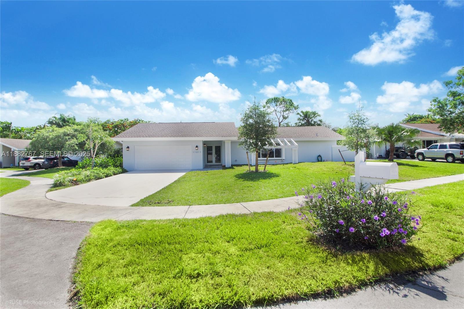 11011 Southwest 110th Road Miami, FL 33176 - Photo 2 of 19 a view of a house with a garden and plants