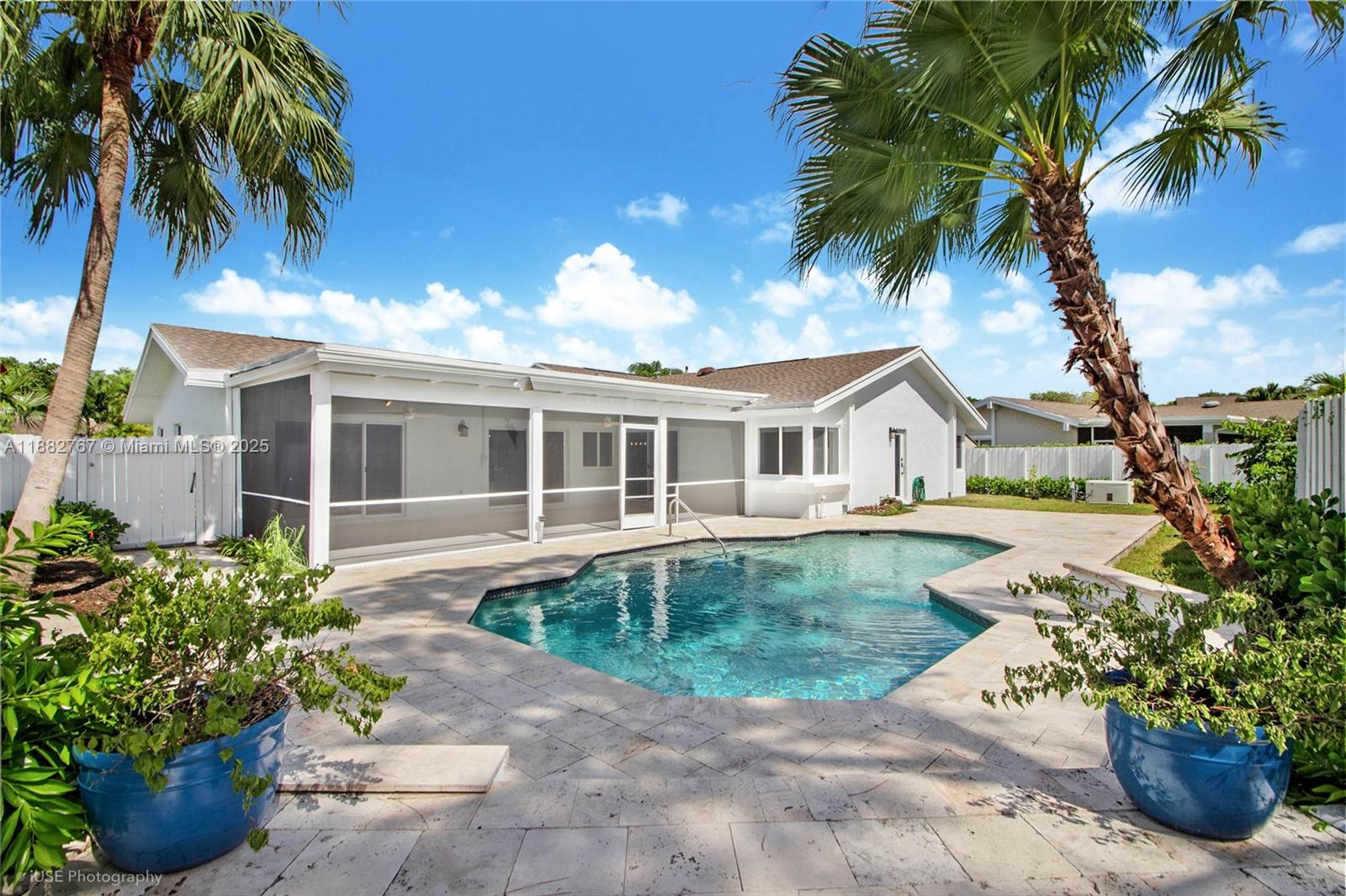 11011 Southwest 110th Road Miami, FL 33176 - Photo 3 of 19 a front view of a house with a garden