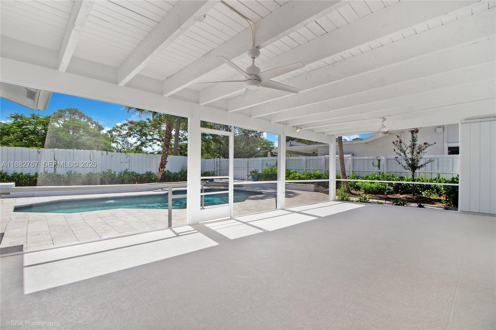 11011 Southwest 110th Road Miami, FL 33176 - Photo 5 of 19 a view of a livingroom with furniture and floor to ceiling window
