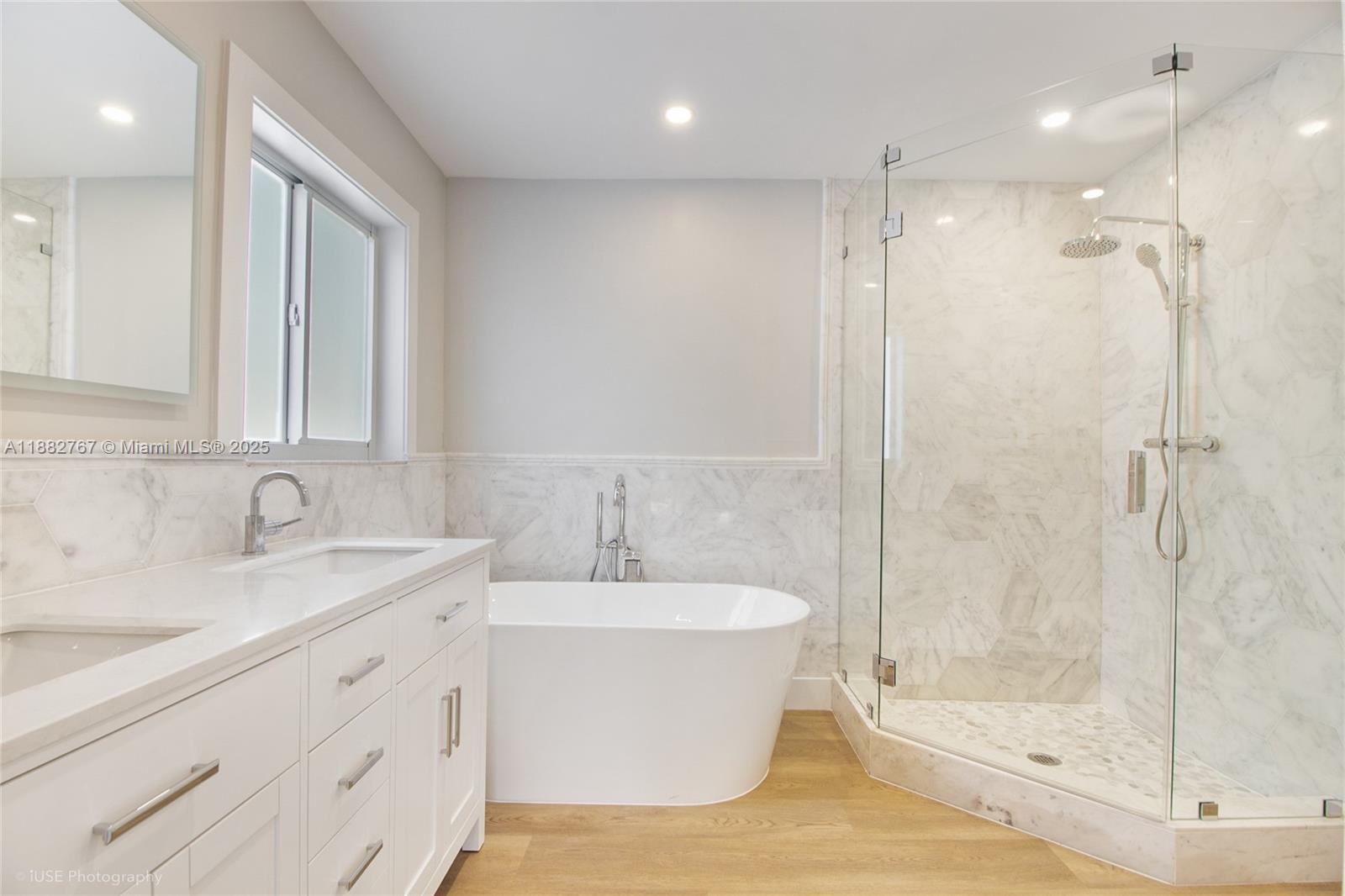 11011 Southwest 110th Road Miami, FL 33176 - Photo 10 of 19 a bathroom with a bathtub and a sink