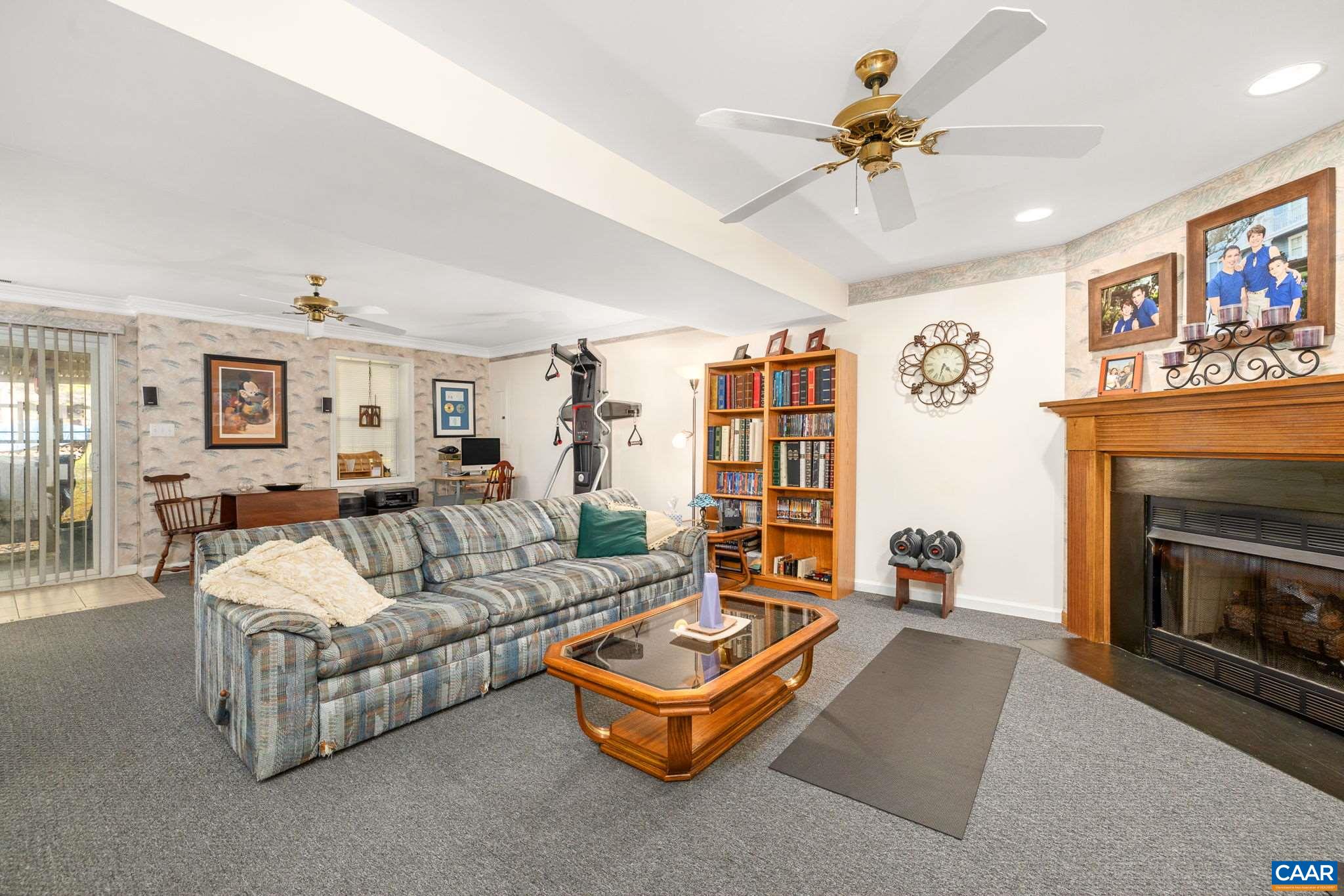5 Dogleg Road Palmyra, VA 22963 - Photo 45 of 63 a living room with furniture and a fireplace