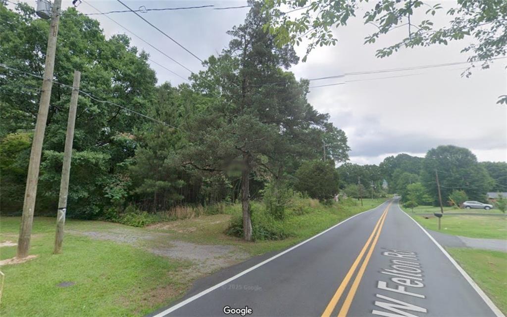 123 West Felton Road Cartersville, GA 30120 - Photo 3 of 3 a view of a wooden deck and a yard