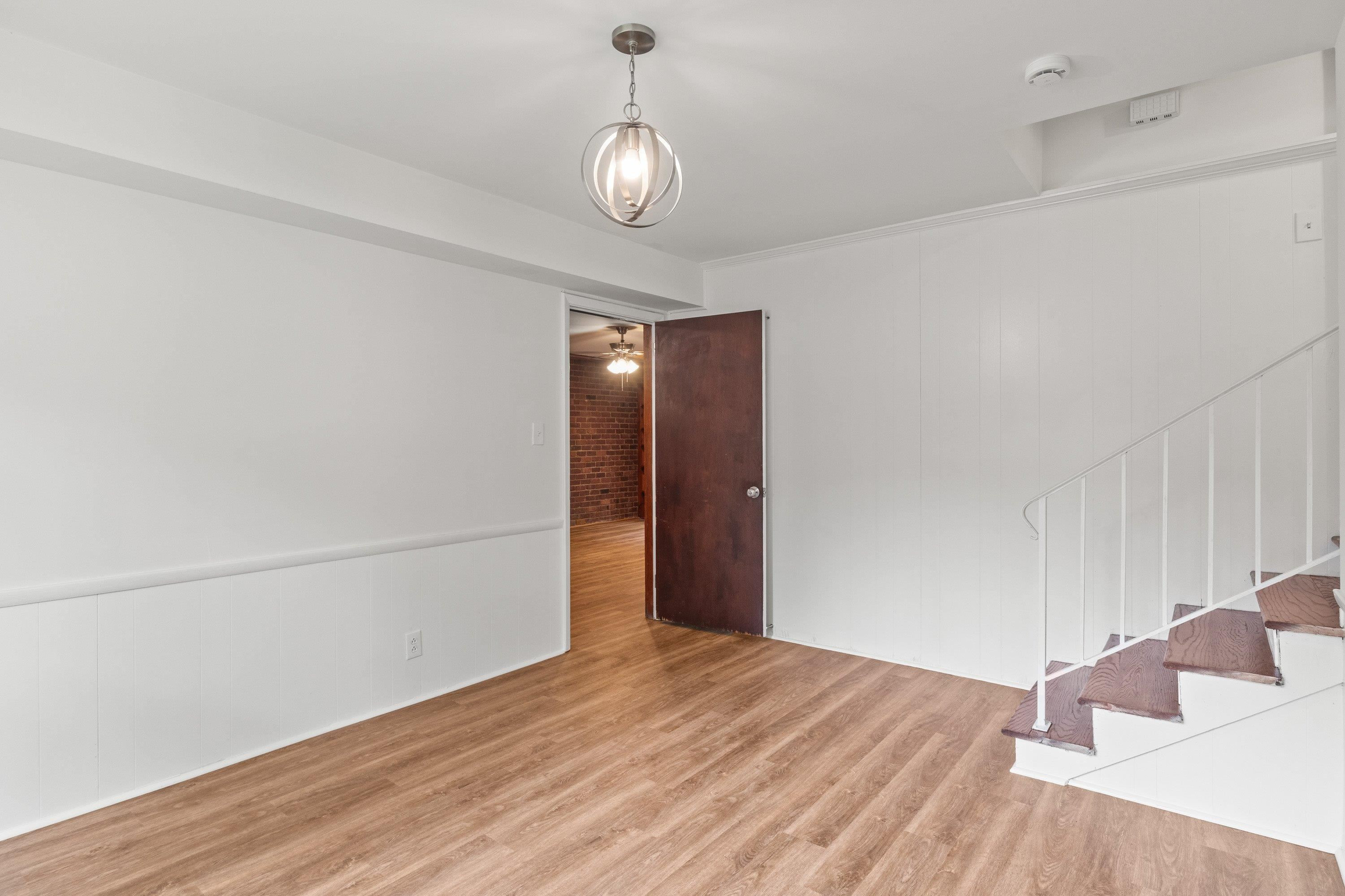 3316 Julian Drive Raleigh, NC 27604 - Photo 12 of 43 a view of empty room with wooden floor