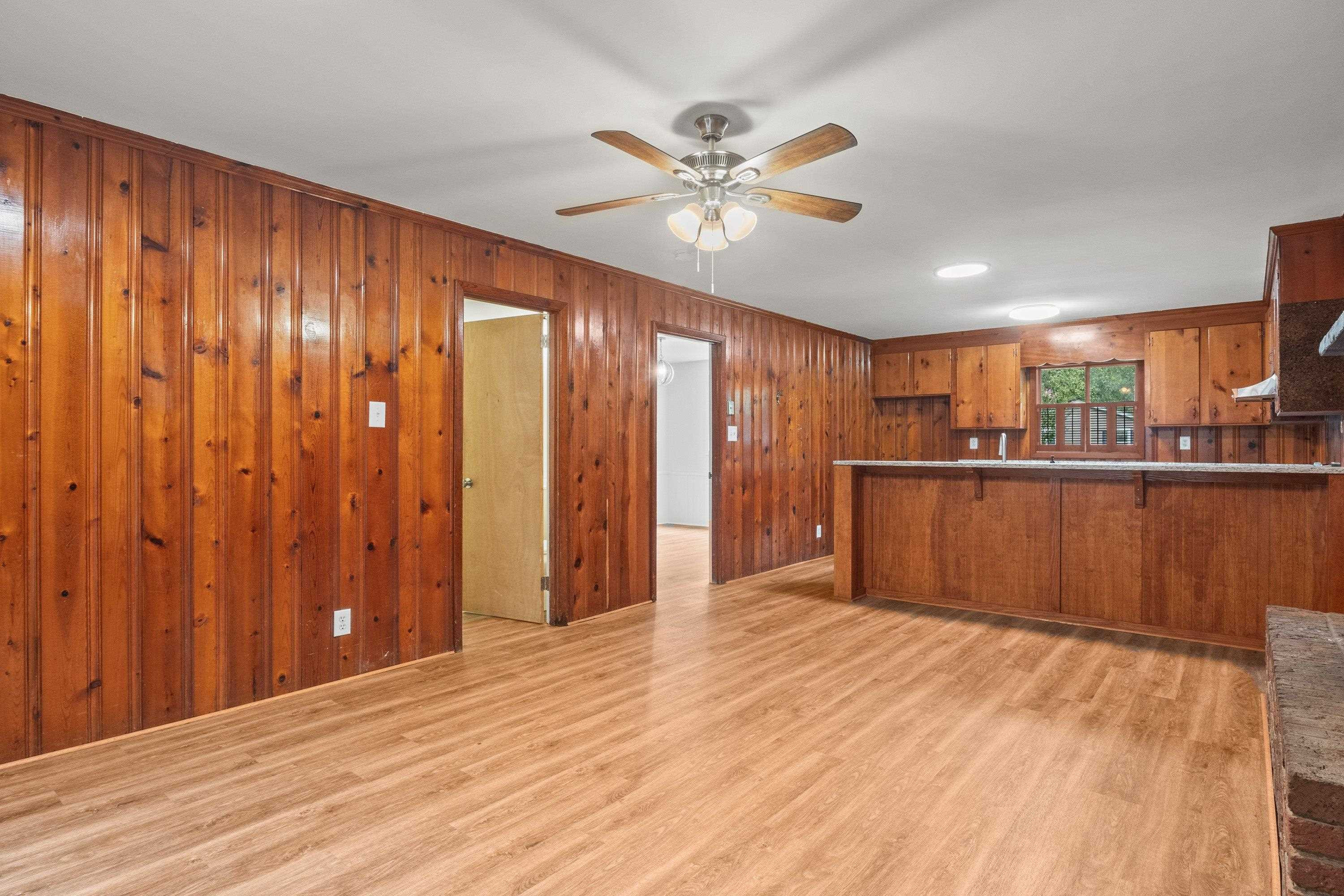 3316 Julian Drive Raleigh, NC 27604 - Photo 15 of 43 a view of a kitchen with wooden floor and a kitchen