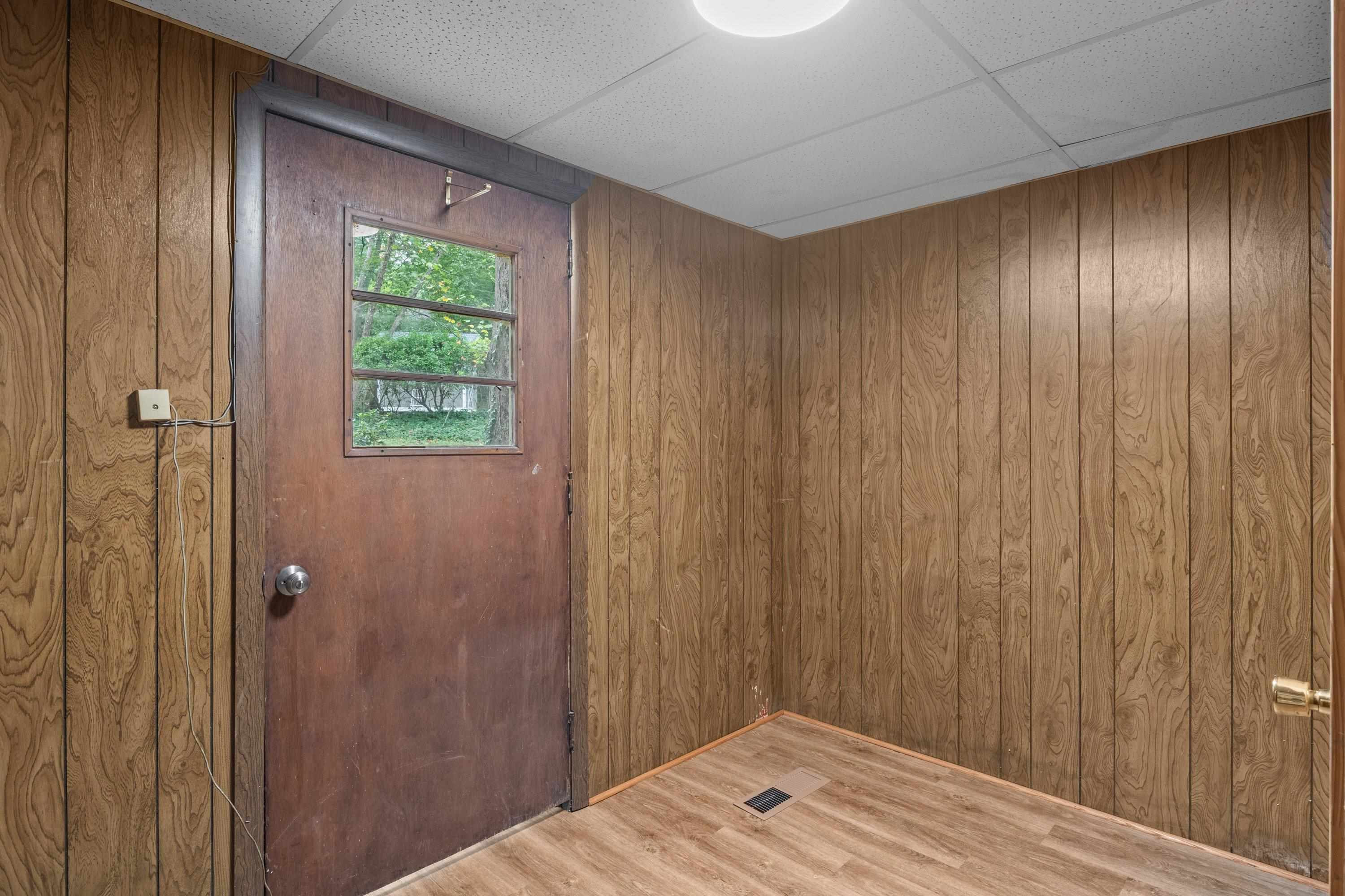 3316 Julian Drive Raleigh, NC 27604 - Photo 24 of 43 a view of hallway with wooden floor