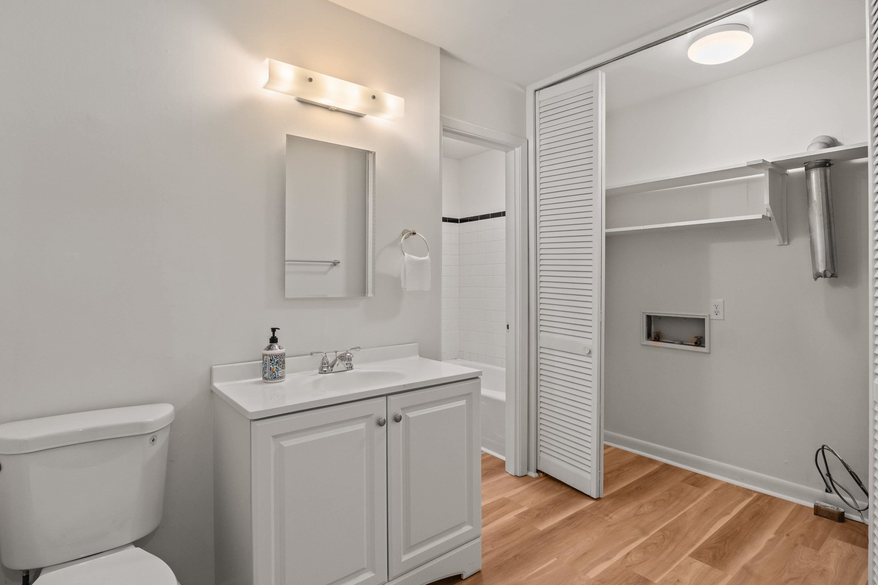 3316 Julian Drive Raleigh, NC 27604 - Photo 26 of 43 a bathroom with a sink a toilet a mirror and shower