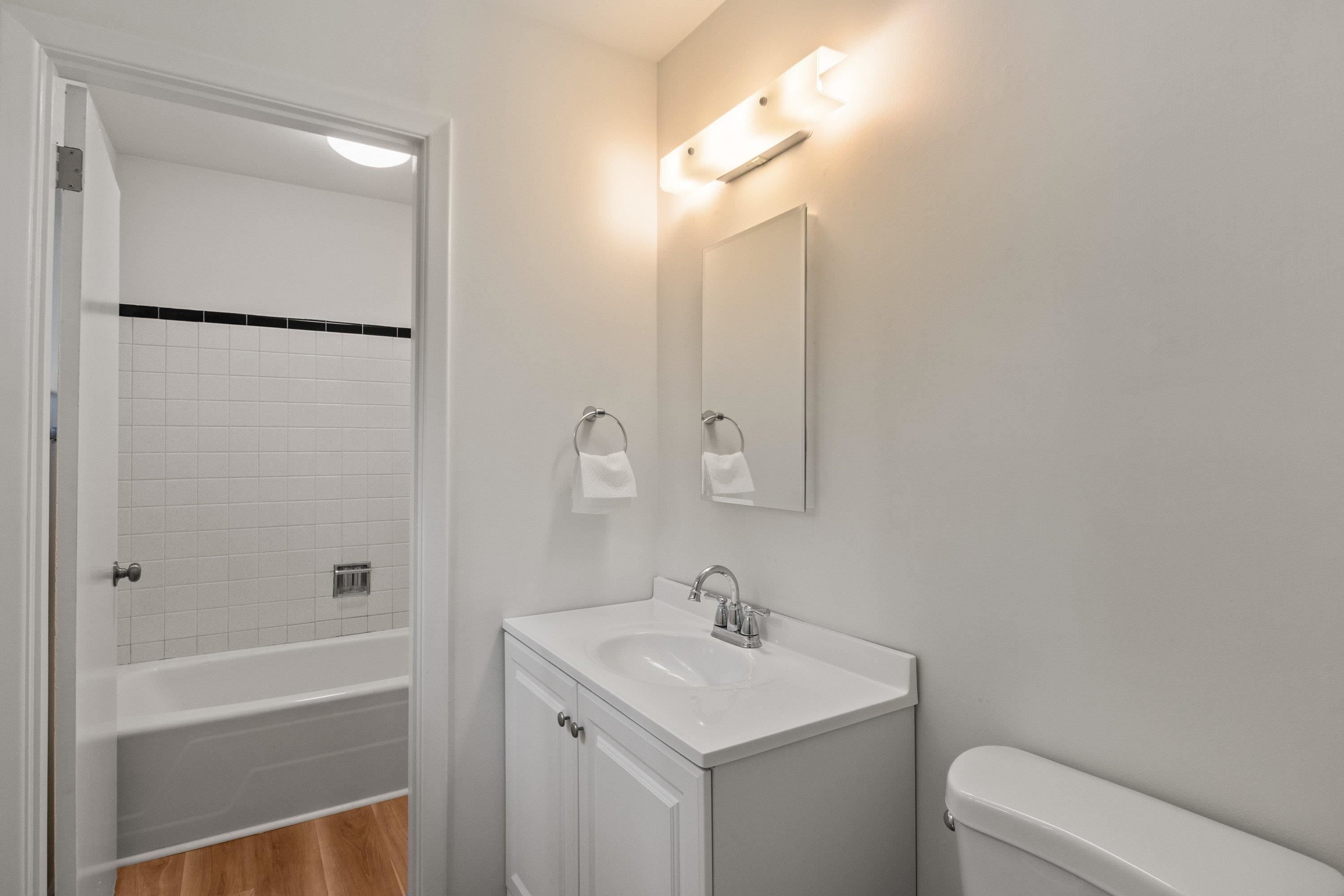 3316 Julian Drive Raleigh, NC 27604 - Photo 29 of 43 a bathroom with a sink a toilet and shower