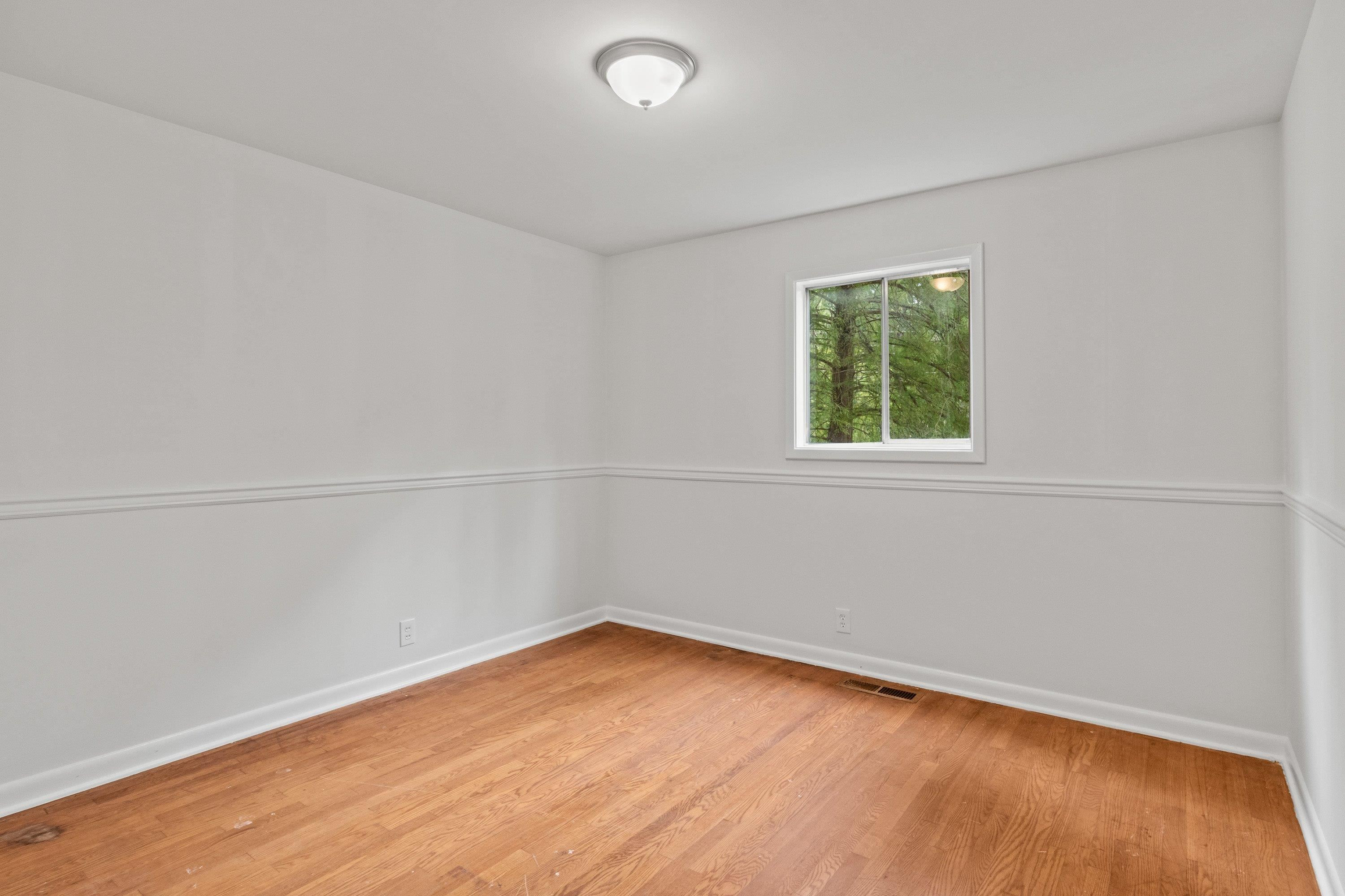 3316 Julian Drive Raleigh, NC 27604 - Photo 32 of 43 an empty room with a window