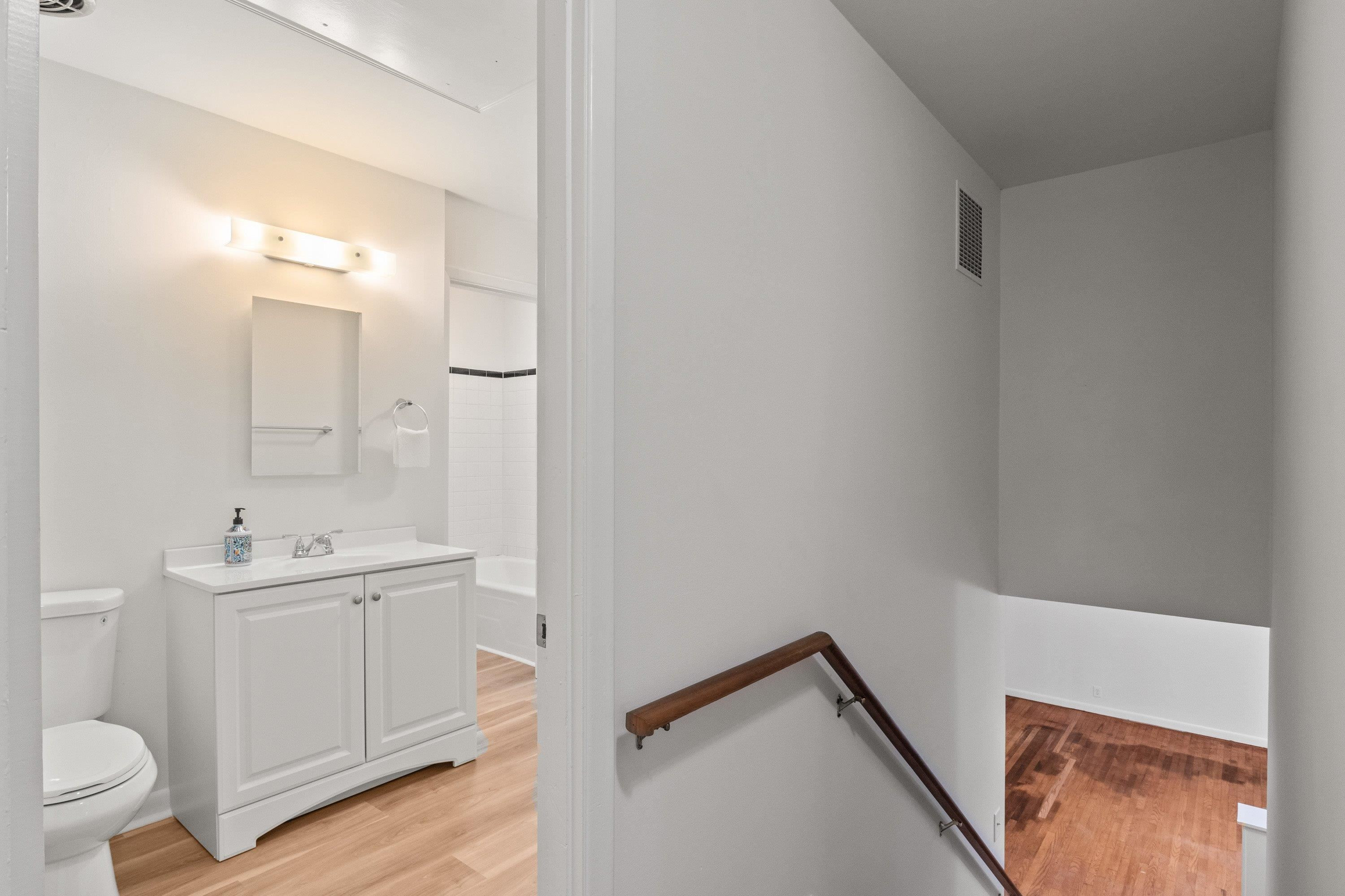 3316 Julian Drive Raleigh, NC 27604 - Photo 36 of 43 a bathroom with a sink a toilet and a mirror