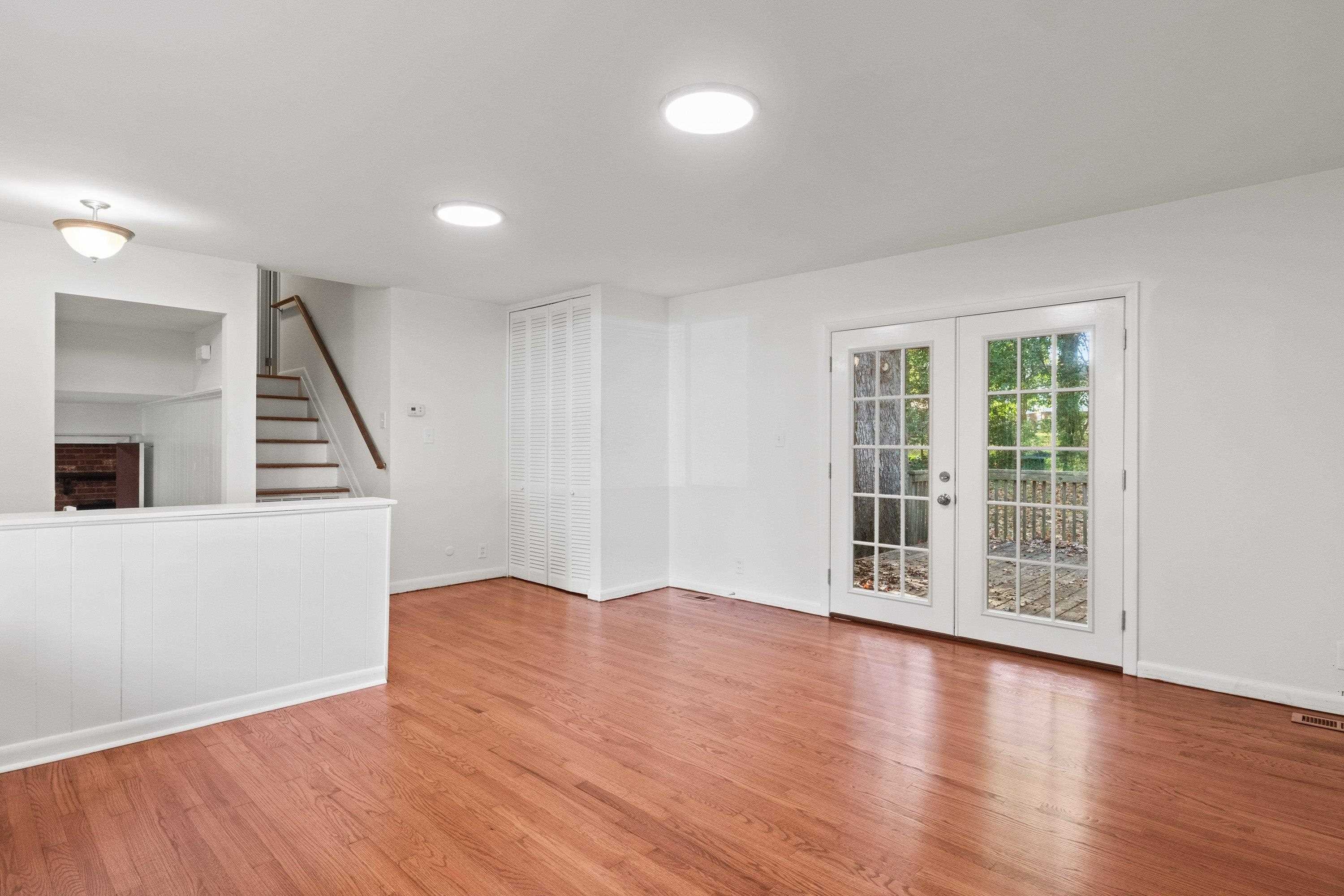 3316 Julian Drive Raleigh, NC 27604 - Photo 8 of 43 wooden floor in an empty room with a window