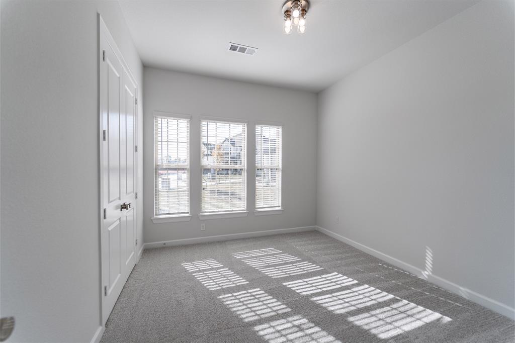 3908 Friendship Court Forney, TX 75126 - Photo 28 of 29 a view of an empty room with a window