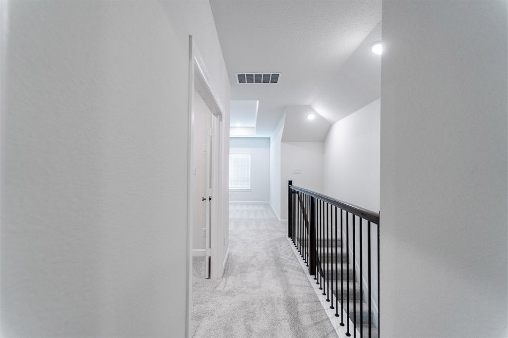 3908 Friendship Court Forney, TX 75126 - Photo 29 of 29 a view of a hallway with entryway