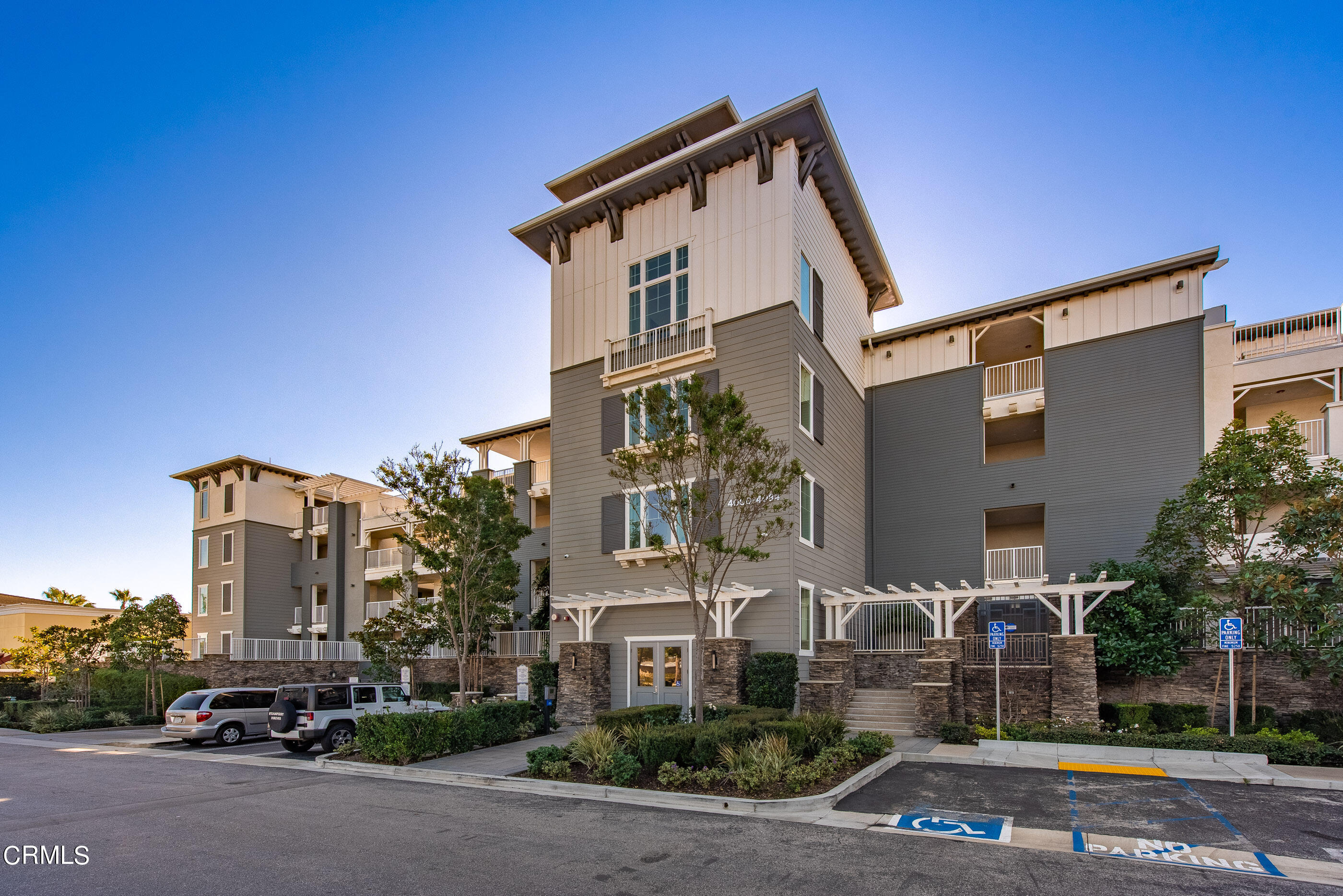 a front view of a building with street view