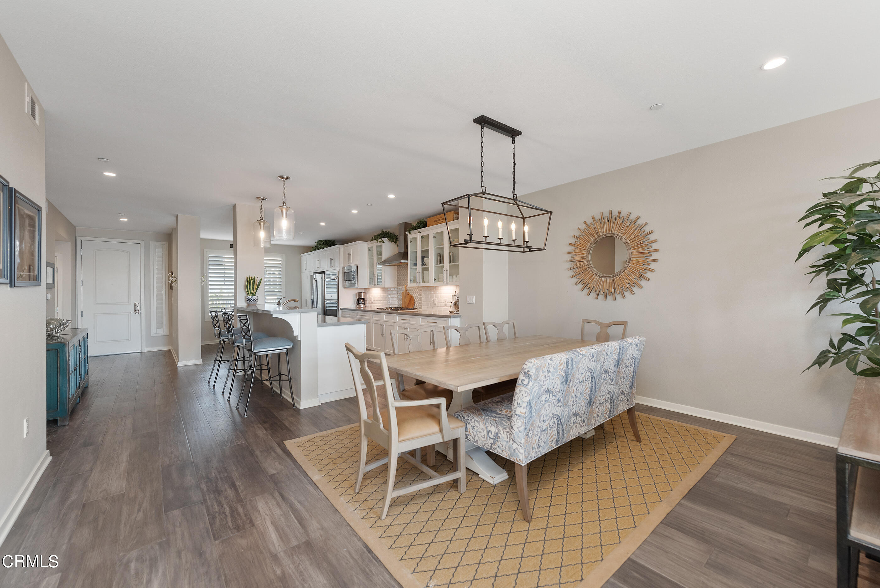 4048 Tradewinds Drive Oxnard, CA 93035 - Photo 12 of 53 a view of a dining room with furniture