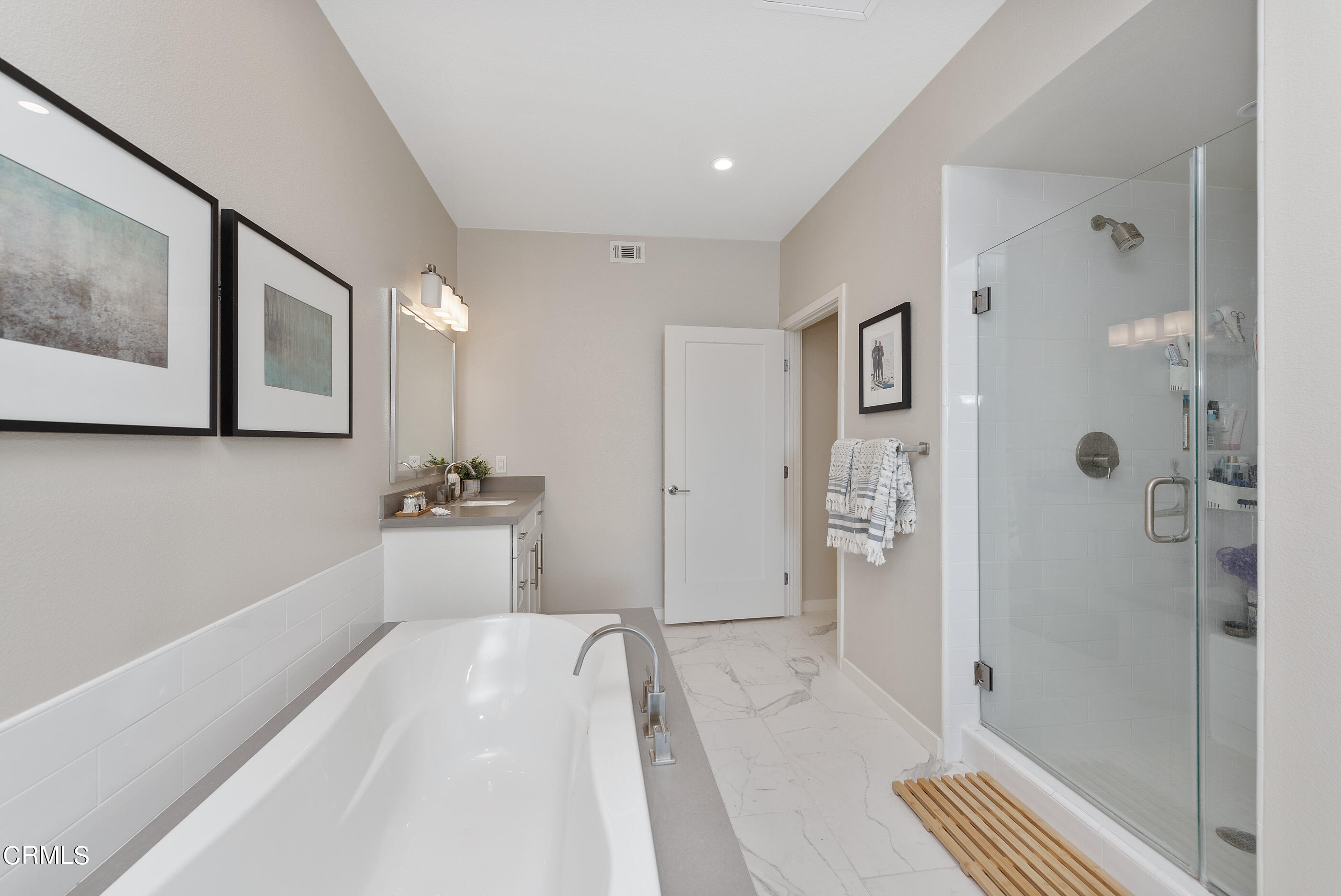 4048 Tradewinds Drive Oxnard, CA 93035 - Photo 21 of 53 a spacious bathroom with a bathtub and a shower
