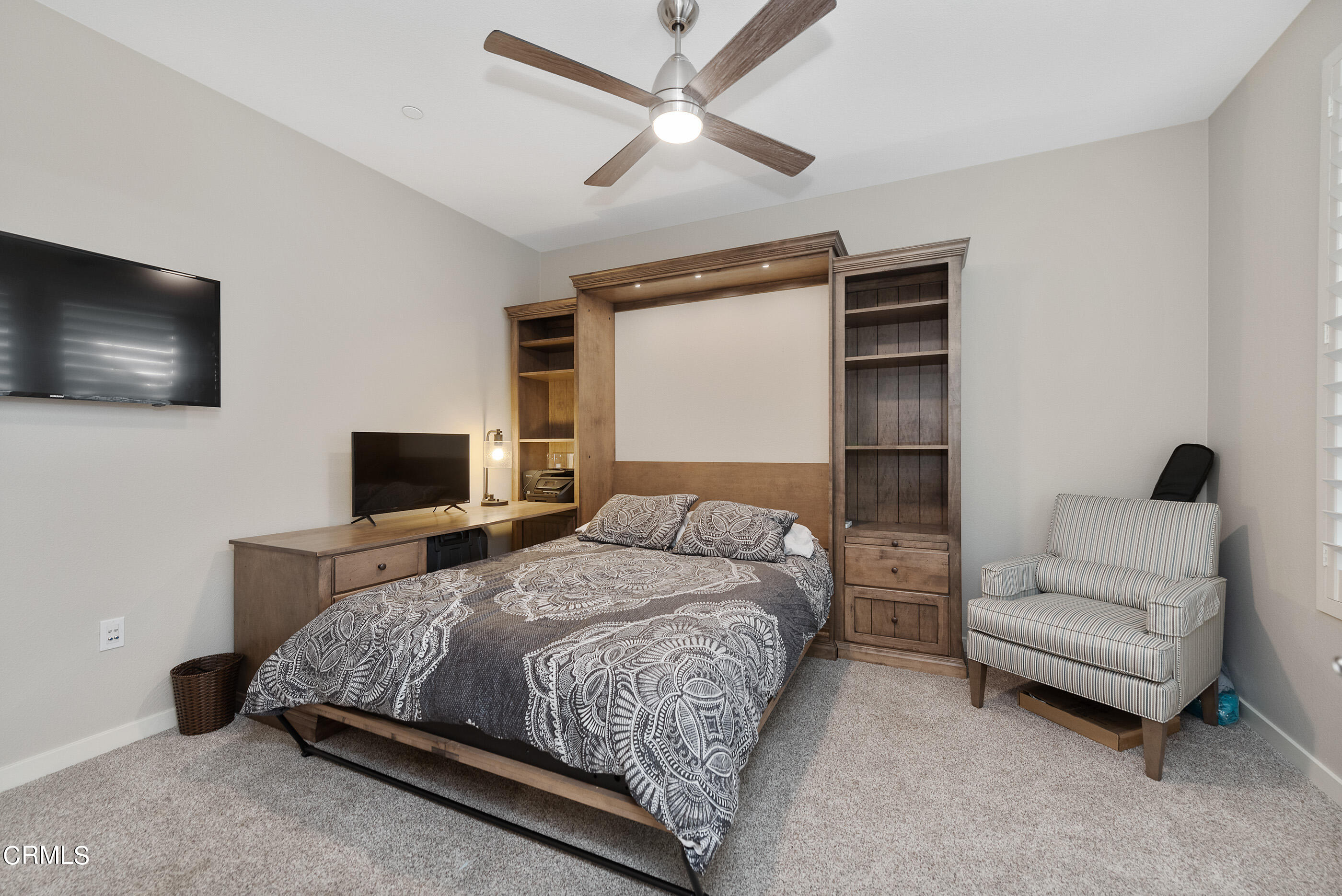 4048 Tradewinds Drive Oxnard, CA 93035 - Photo 24 of 53 a bedroom with a bed and a flat screen tv