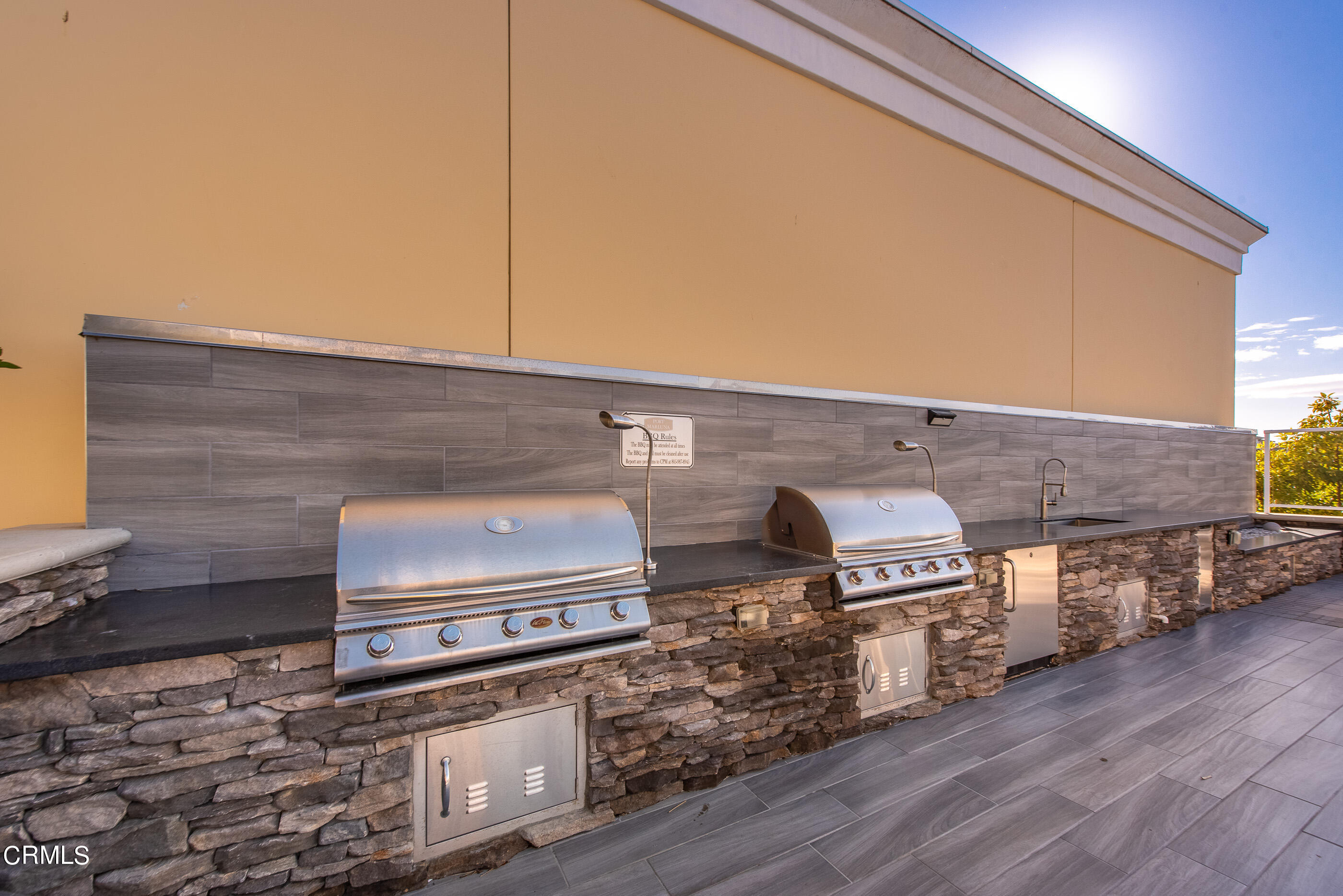 4048 Tradewinds Drive Oxnard, CA 93035 - Photo 34 of 53 a kitchen with stove and cabinets