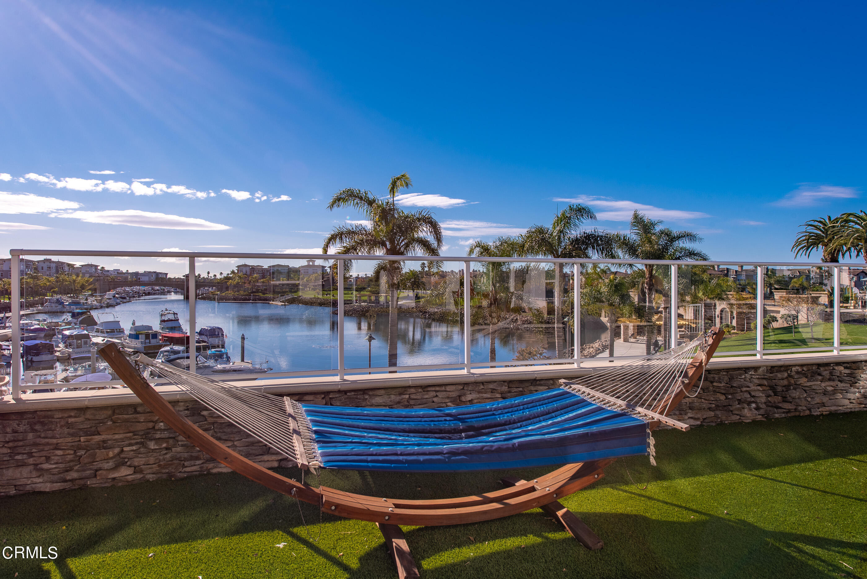 4048 Tradewinds Drive Oxnard, CA 93035 - Photo 39 of 53 a view of a swimming pool with outdoor seating