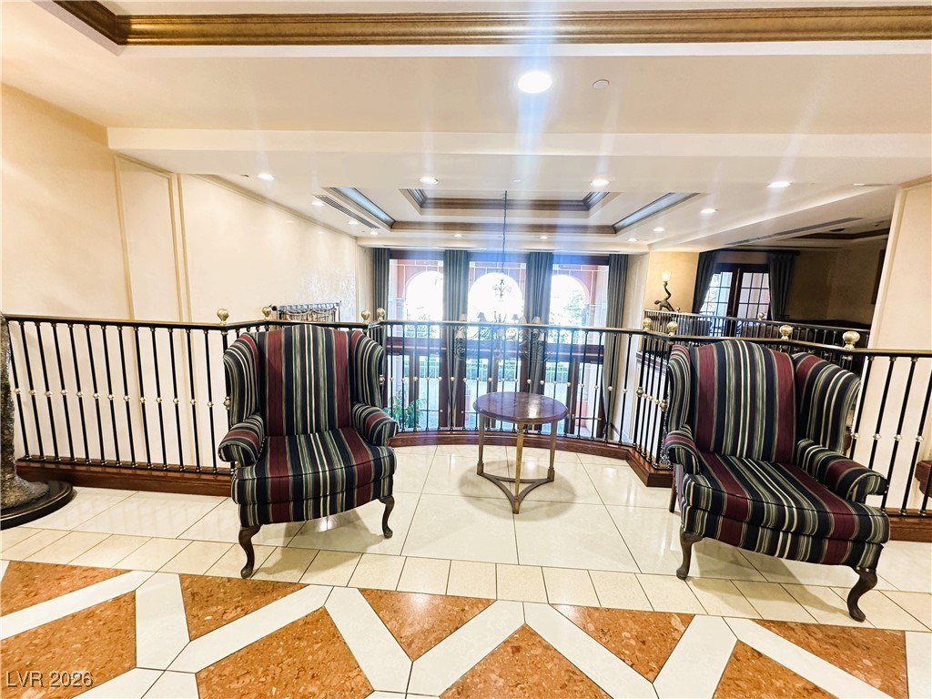 30 Strada Di Villaggio, Unit 627 Henderson, NV 89011 - Photo 2 of 12 Community lobby with crown molding and recessed lighting