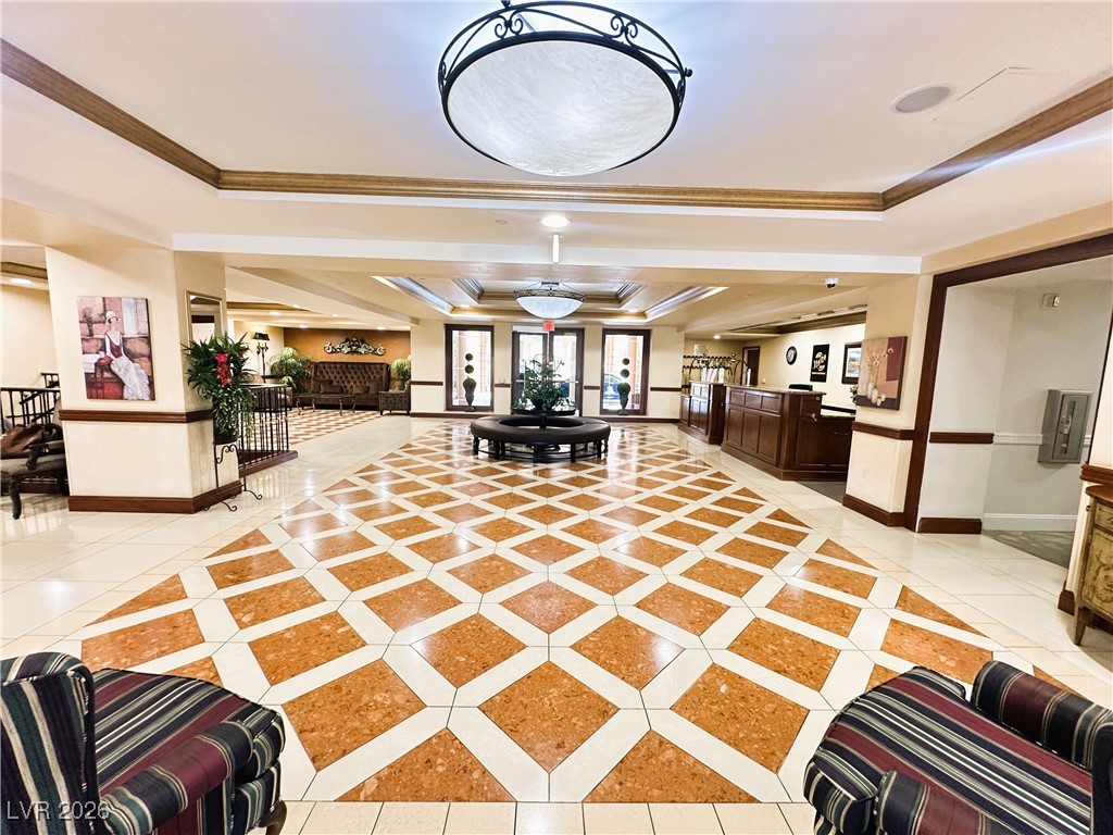 30 Strada Di Villaggio, Unit 627 Henderson, NV 89011 - Photo 3 of 12 Community lobby with crown molding