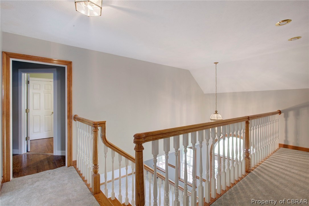 140 Mill Point Road Hudgins, VA 23076 - Photo 34 of 47 a view of a hallway with wooden floor and staircase