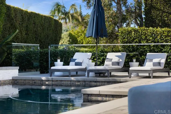 a view of house with outdoor seating