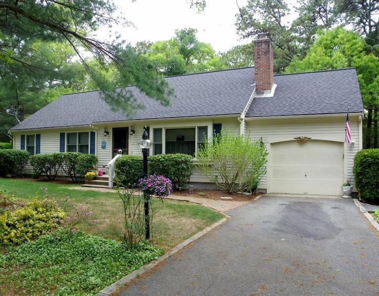 56 Shields Road Mashpee, MA 02649 - Photo 2 of 17 a house view with a garden space
