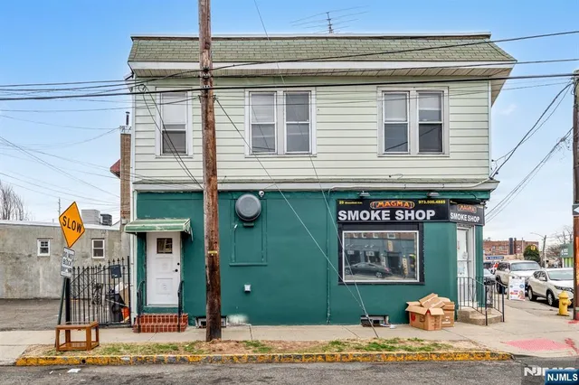a front view of a building with glass windows