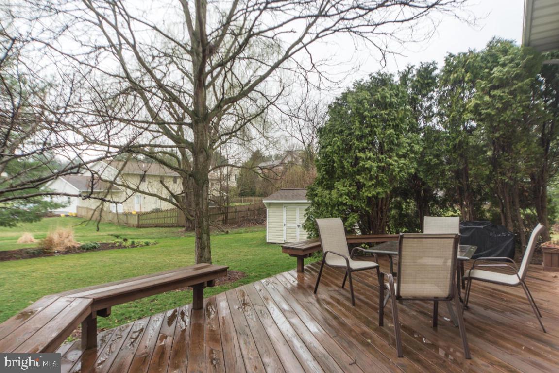 956 Spring Road Elizabethtown, PA 17022 - Photo 23 of 27 a view of a deck with furniture and a yard