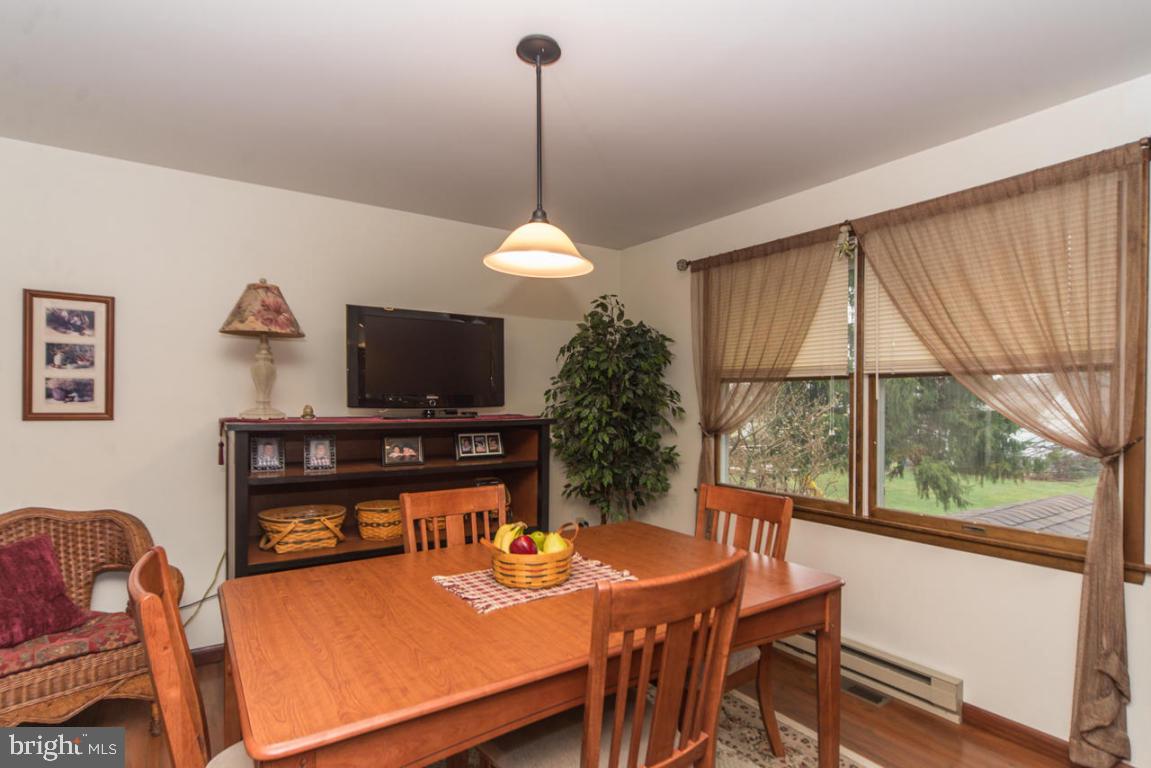 956 Spring Road Elizabethtown, PA 17022 - Photo 7 of 27 a view of a dining room with furniture window and outside view