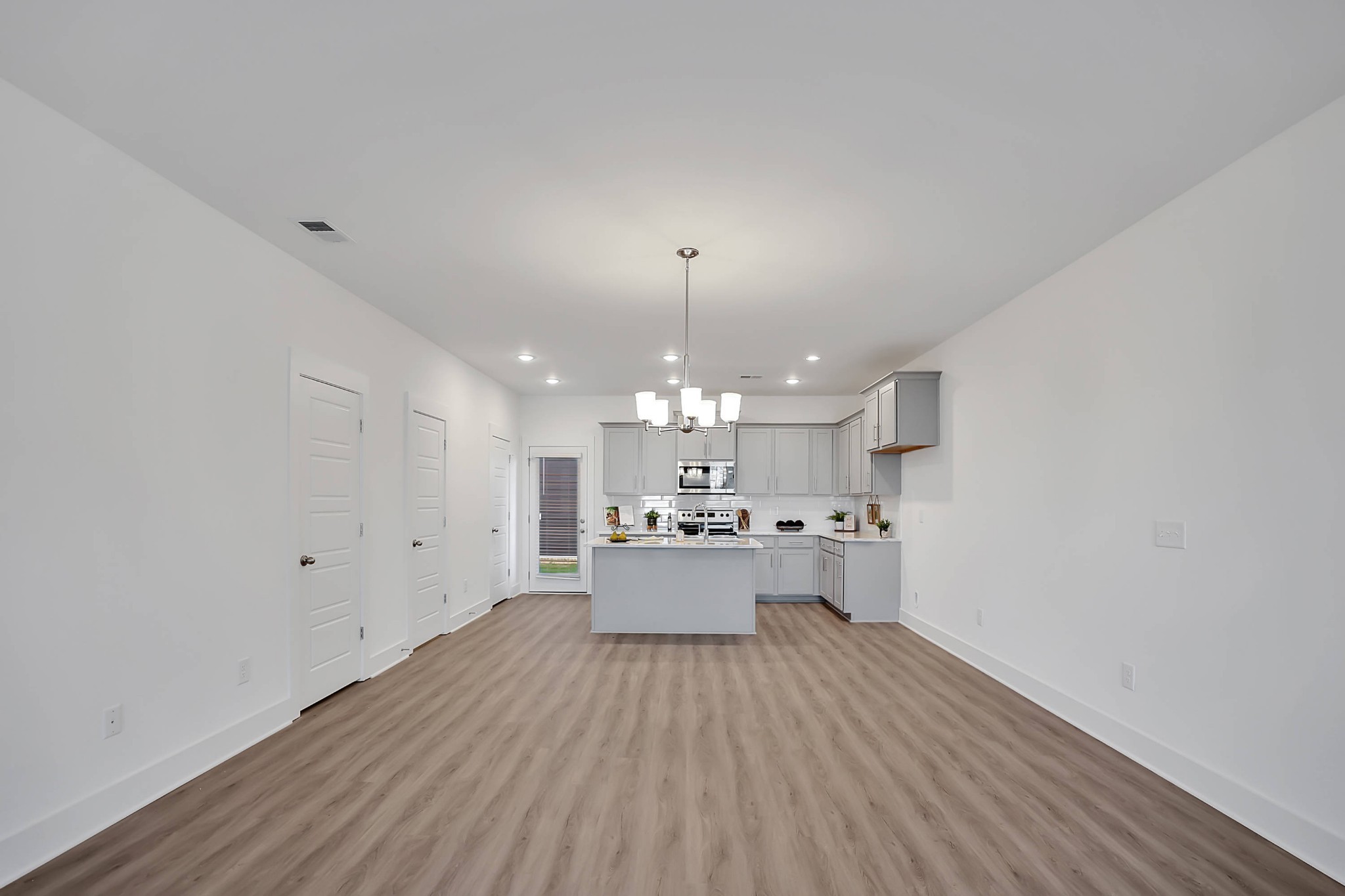 106 Floyd Junction Lebanon, TN 37087 - Photo 11 of 24 a view of a kitchen with a sink and microwave