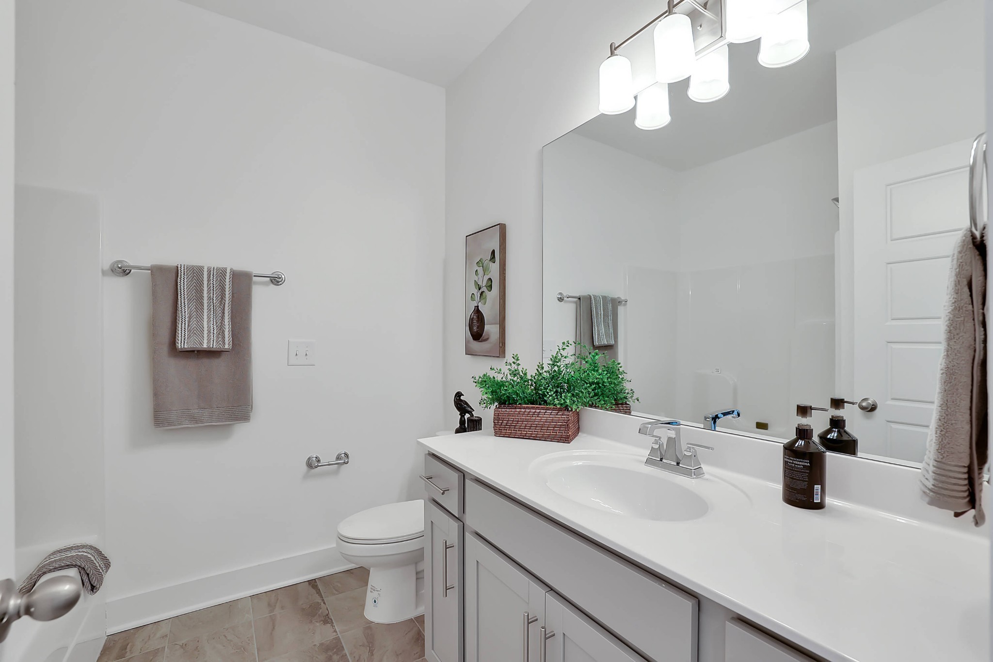 106 Floyd Junction Lebanon, TN 37087 - Photo 19 of 24 a bathroom with a sink a toilet and mirror