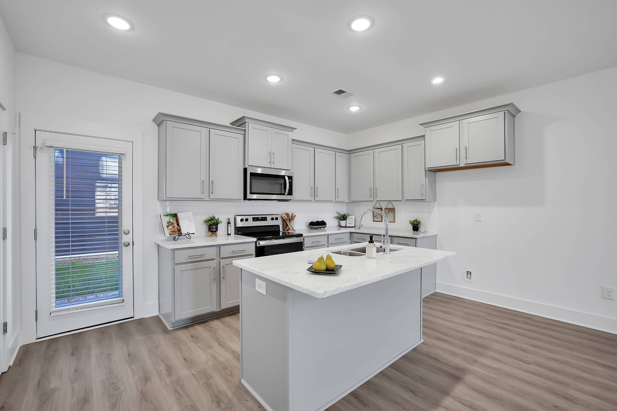 106 Floyd Junction Lebanon, TN 37087 - Photo 7 of 24 a kitchen with a sink stove and cabinets