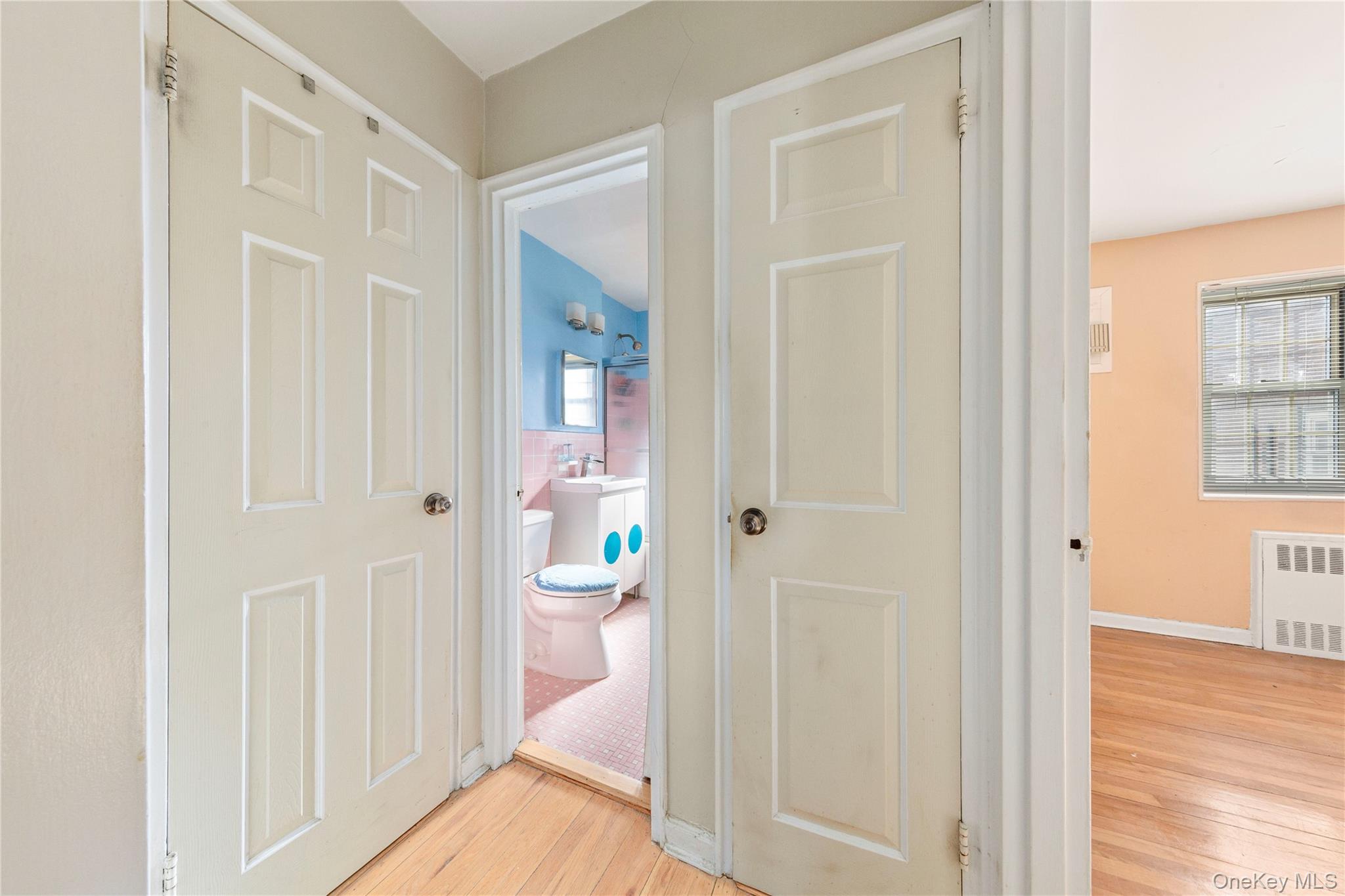 69-21 215th Street, Unit A Queens, NY 11364 - Photo 4 of 14 a view of a bathroom with a sink and a bathroom