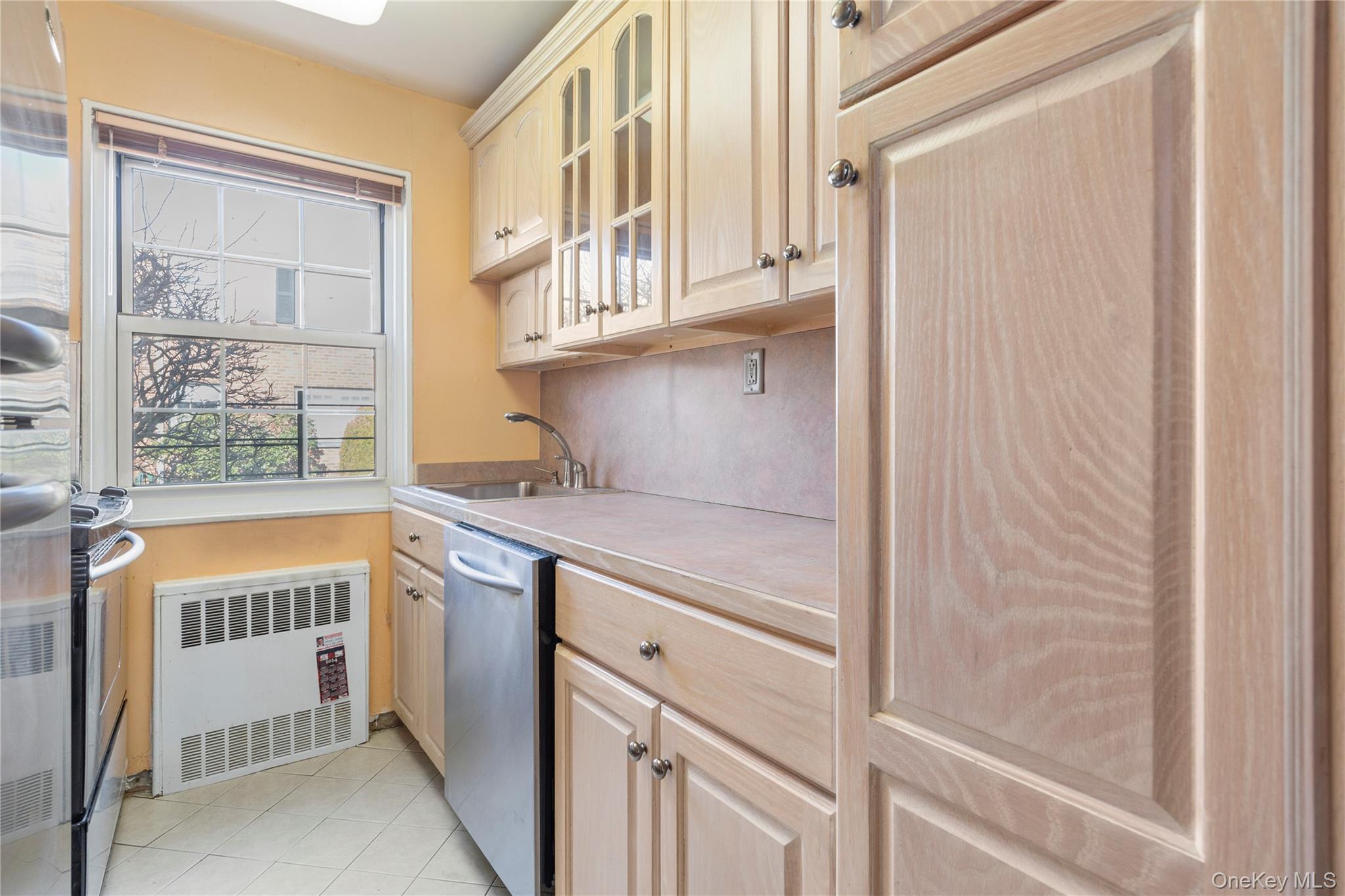 69-21 215th Street, Unit A Queens, NY 11364 - Photo 8 of 14 a utility room with a window