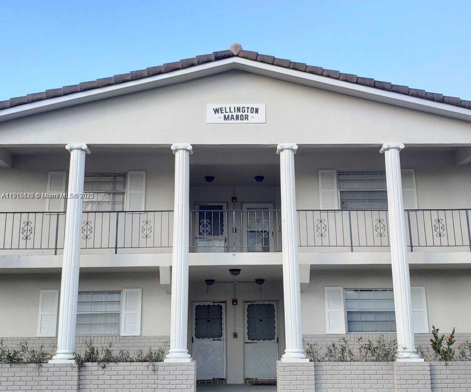 8901 Northwest 38th Drive, Unit 206 Coral Springs, FL 33065 - Photo 17 of 17 a view of a house with entrance and a garage