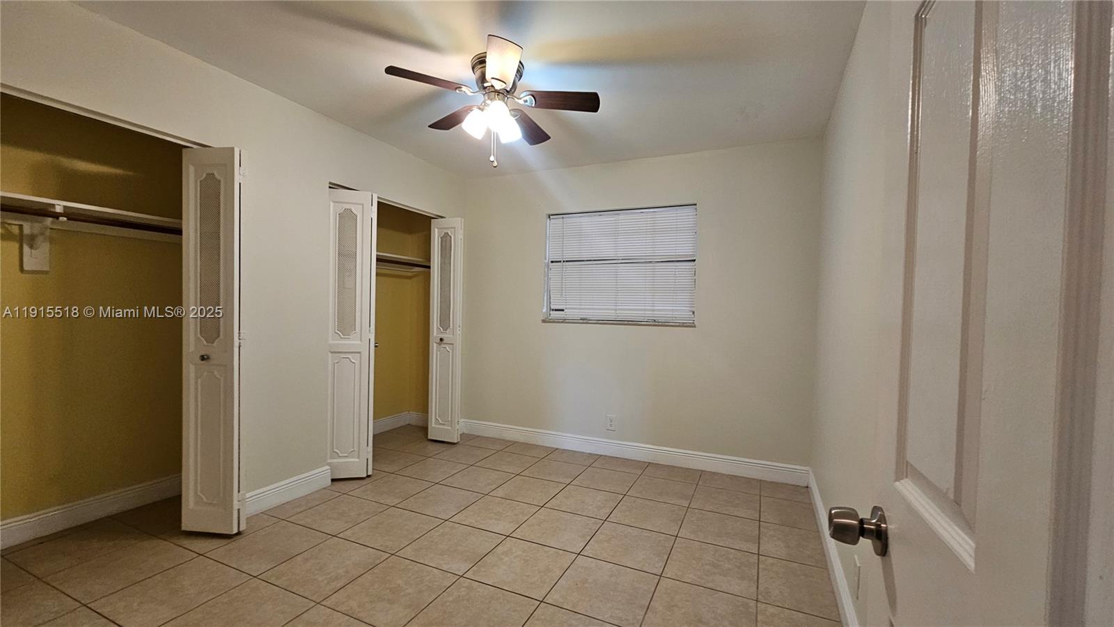 8901 Northwest 38th Drive, Unit 206 Coral Springs, FL 33065 - Photo 6 of 17 wooden floor in an empty room