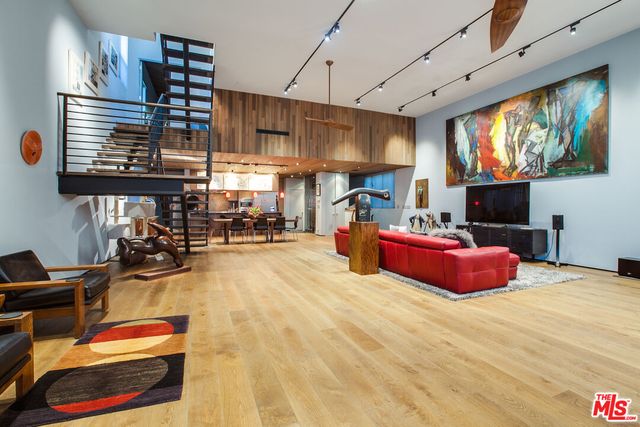 a swimming pool with outdoor seating