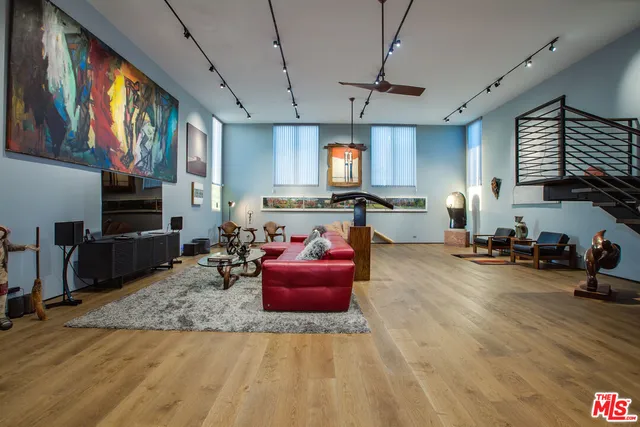 a kitchen with stove and cabinets