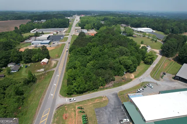 an aerial view of residential house with outdoor space