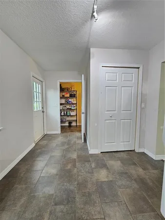 a view of a storage and utility room