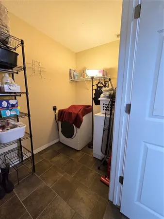 a living room with table tennis and air hockey table